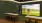 woman standing in front of golf simulator